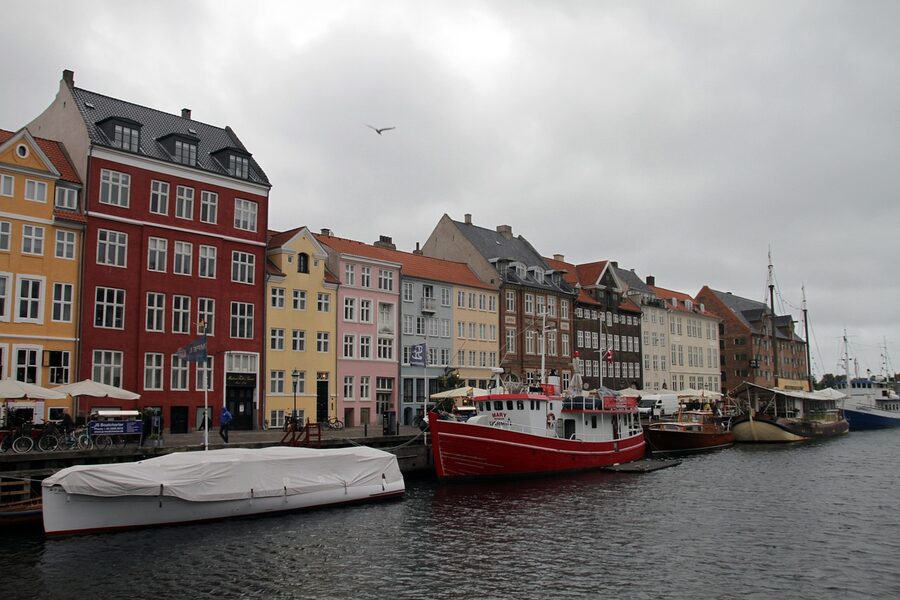 Nyhavn canal landmark with colorful buildings in Copenhagen Denmark