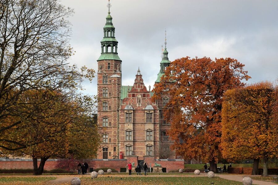 Rosenborg Palace surrounded by autumn foliage