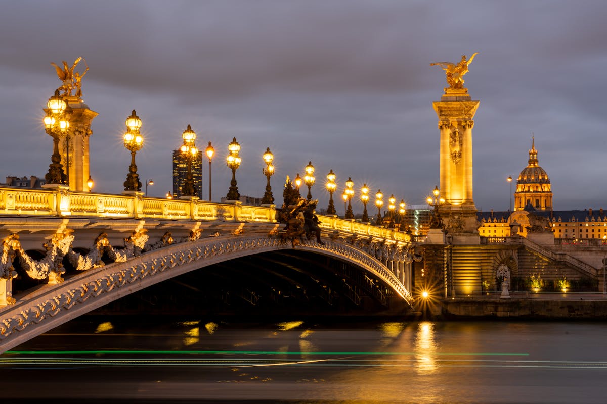 The illuminated Pont Alexandre III bridge in Paris at night