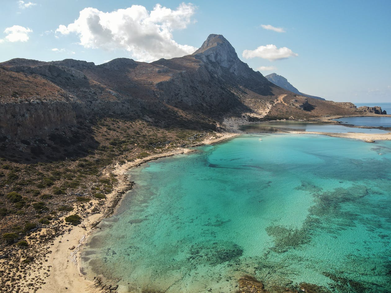 Rugged hills and turquoise waters along Crete coastline