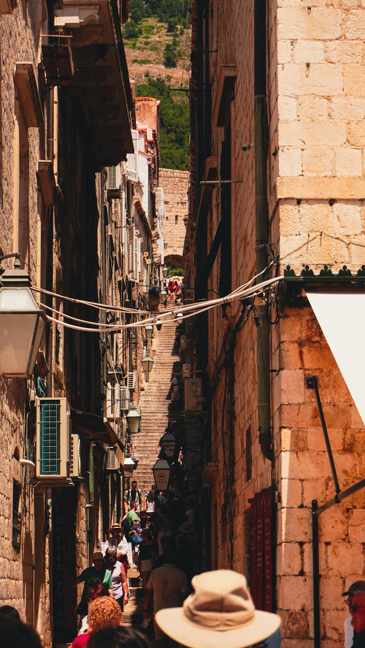 Tourists exploring Dubrovnik Old Town entrance