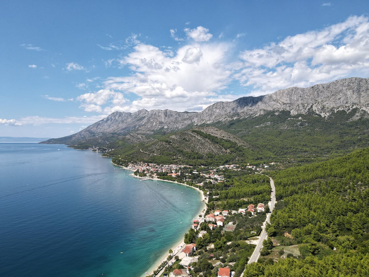 Aerial view of Dalmatian coastline with mountains and sea