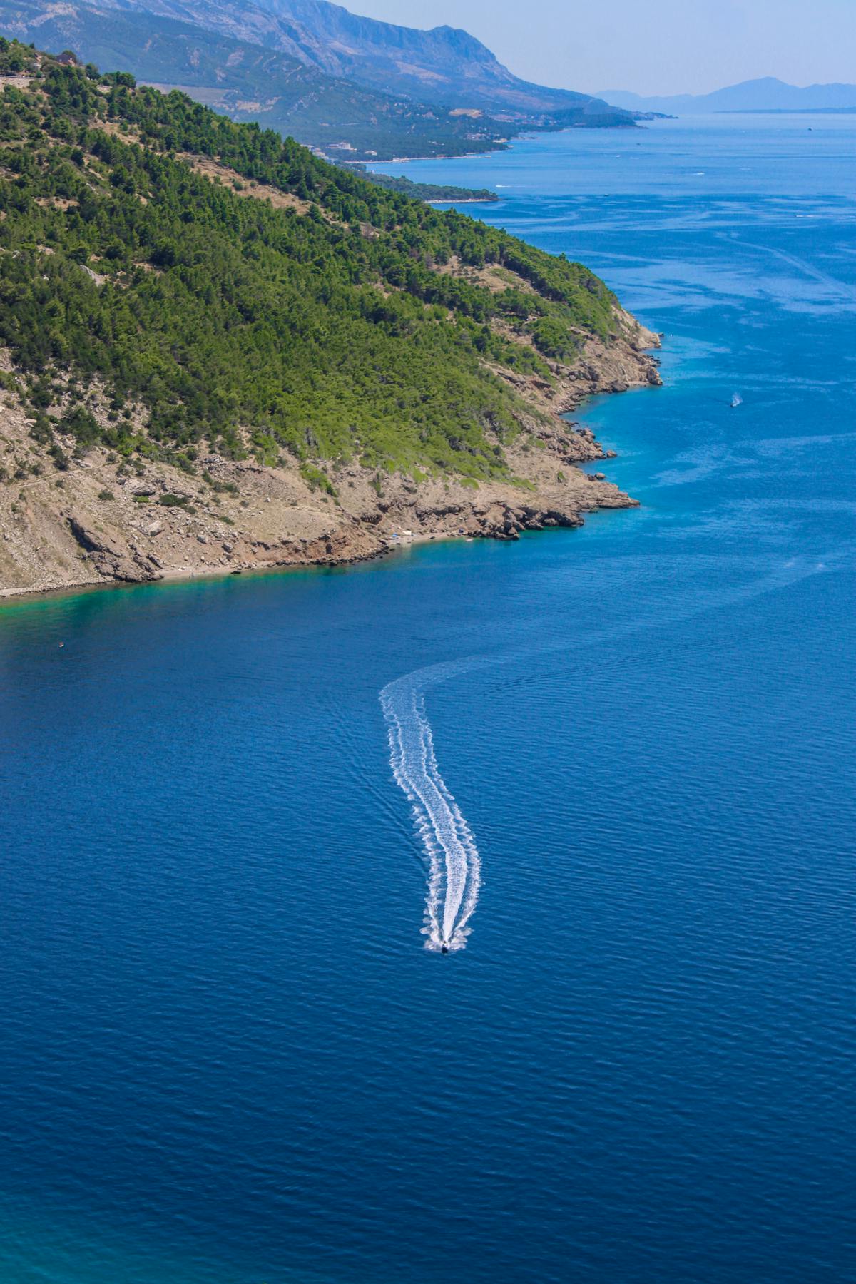 Speedboat on blue Adriatic waters along Croatia's coastline