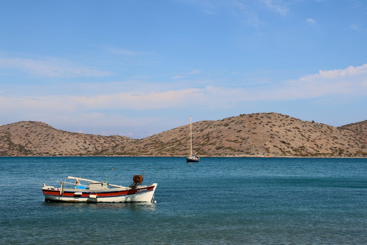 Fishing boats on calm Aegean waters near Greek islands