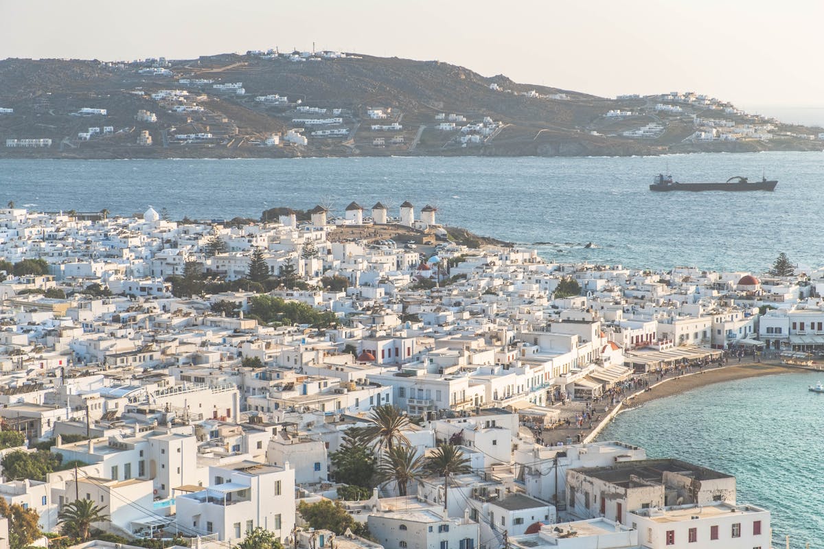 Aerial view of Mykonos Old Port with traditional white buildings