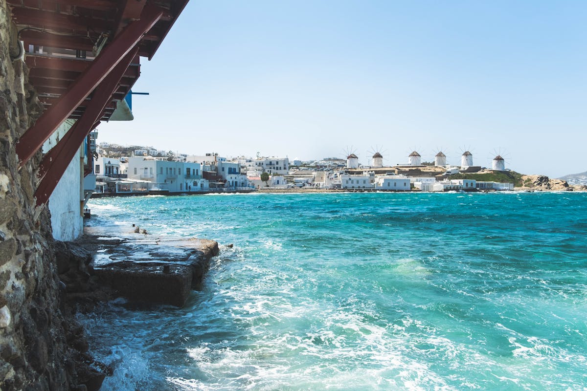 Cycladic windmills against sea and blue sky in the Greek islands