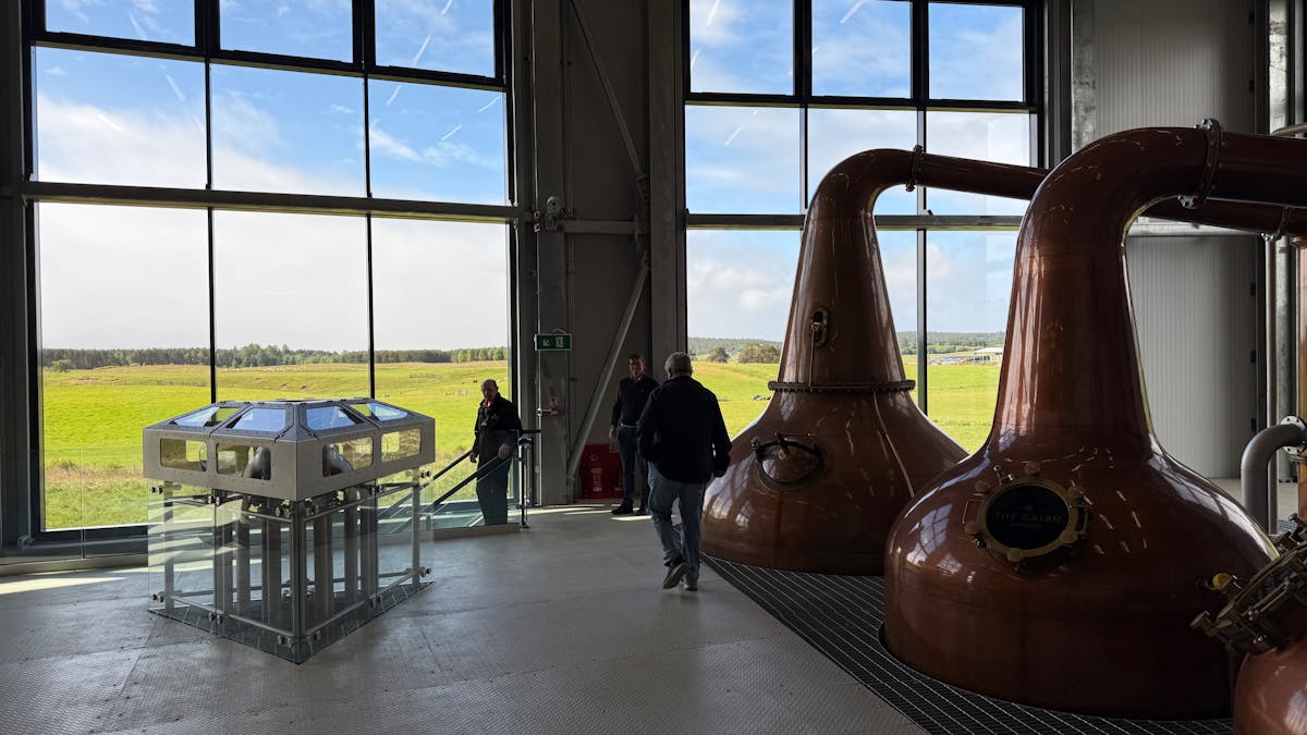 Copper stills inside a Scottish whisky distillery
