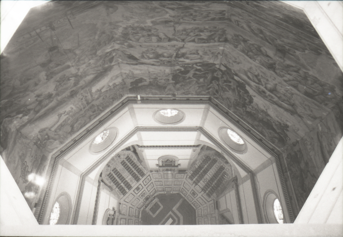 View looking straight up inside Brunelleschi dome showing the circular Last Judgment fresco painting