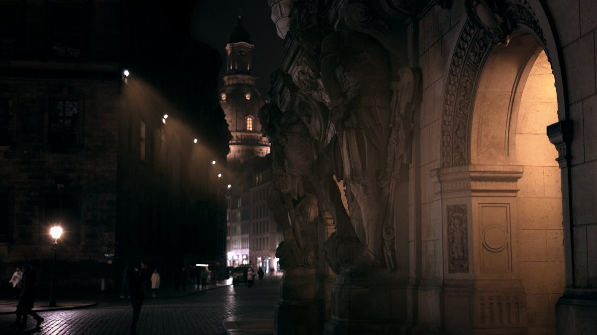 Night view of Dresden old town historic architecture lit by street lights