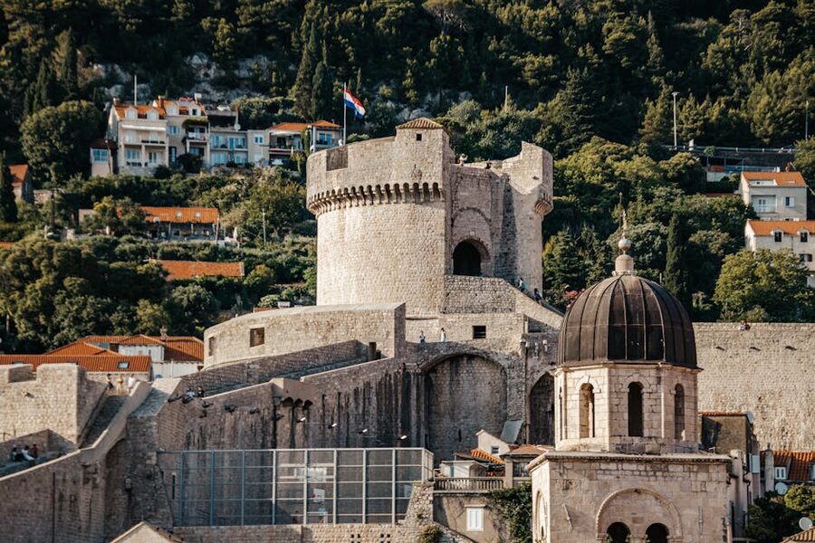 Dubrovnik fortress wall with lush greenery
