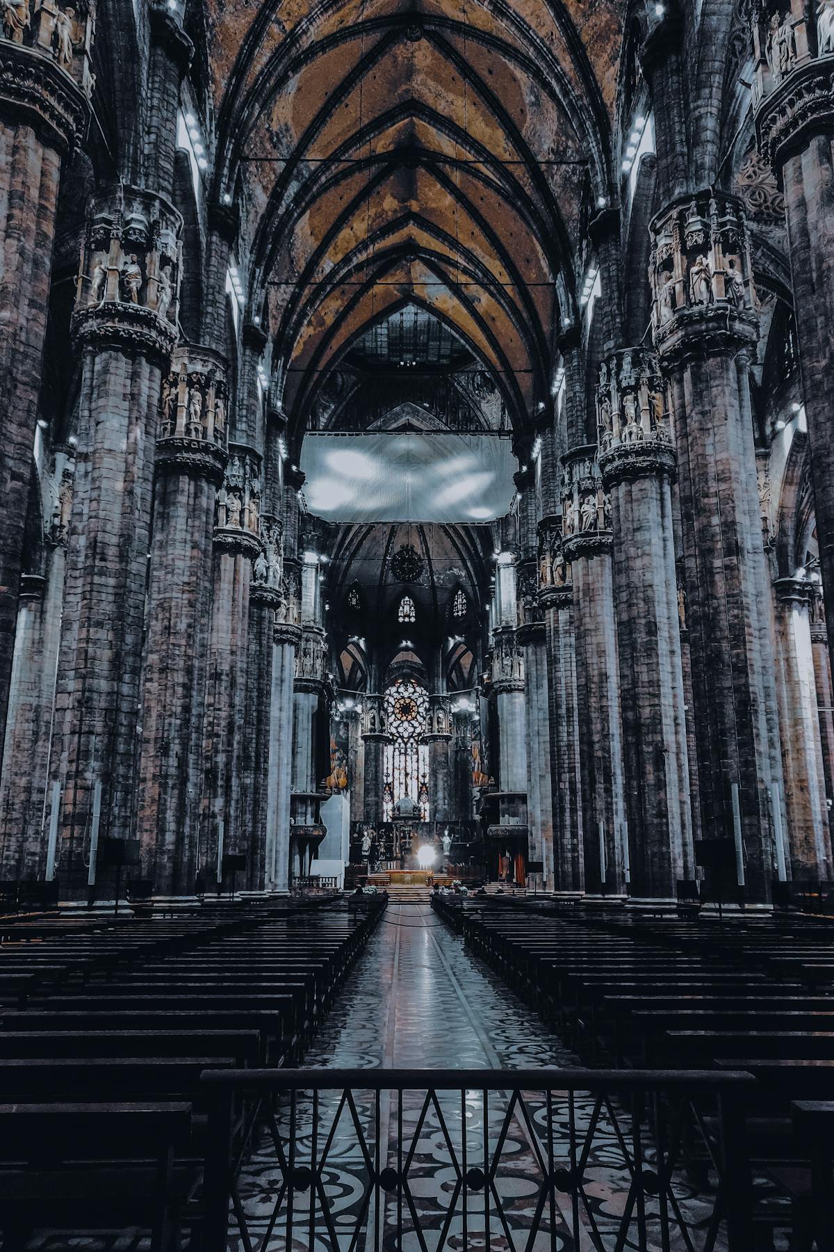 Interior of Milan Cathedral showing Gothic columns and vaulted ceiling