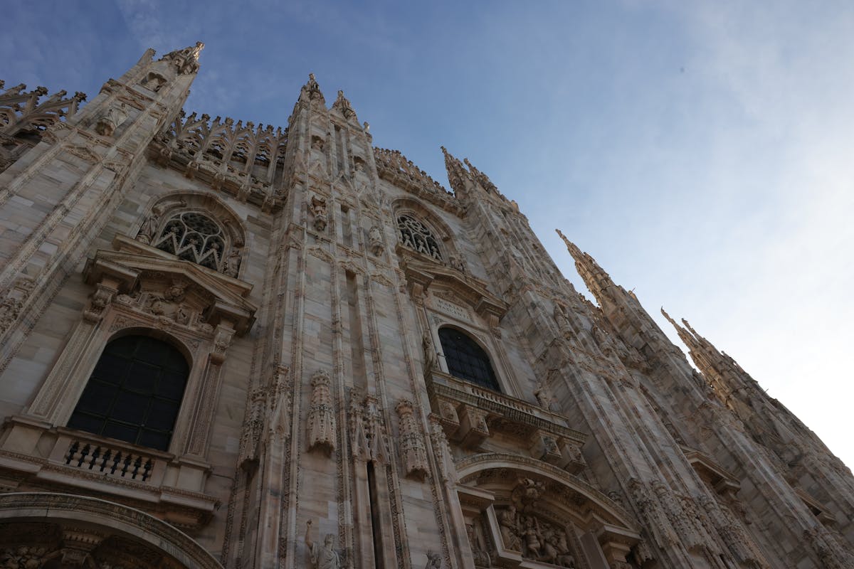Detailed marble carvings and sculptures on Milan Cathedral facade
