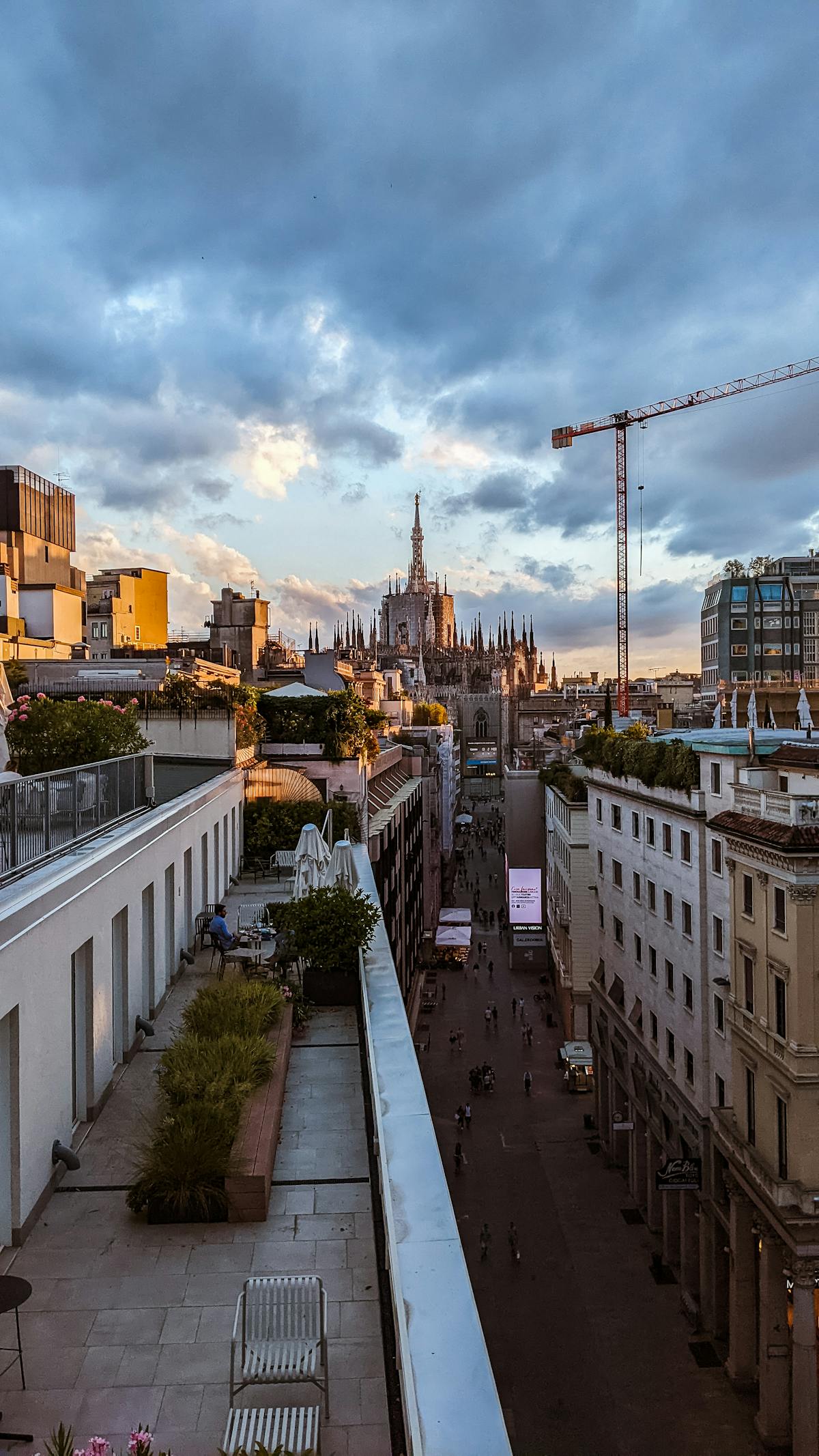 Rooftop terraces of Milan Cathedral with city panorama