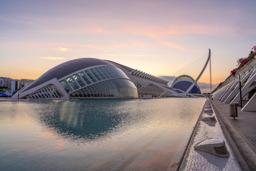 Valencia's futuristic Hemisferic and City of Arts buildings illuminated at dusk