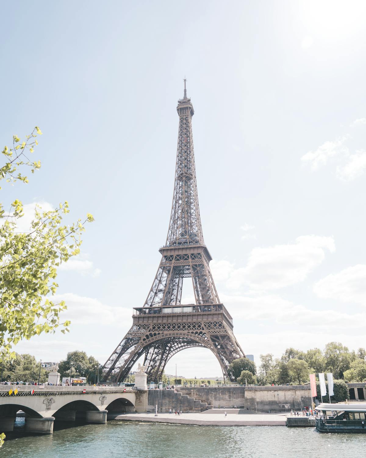 Eiffel Tower seen from across the Seine River on a clear day in Paris