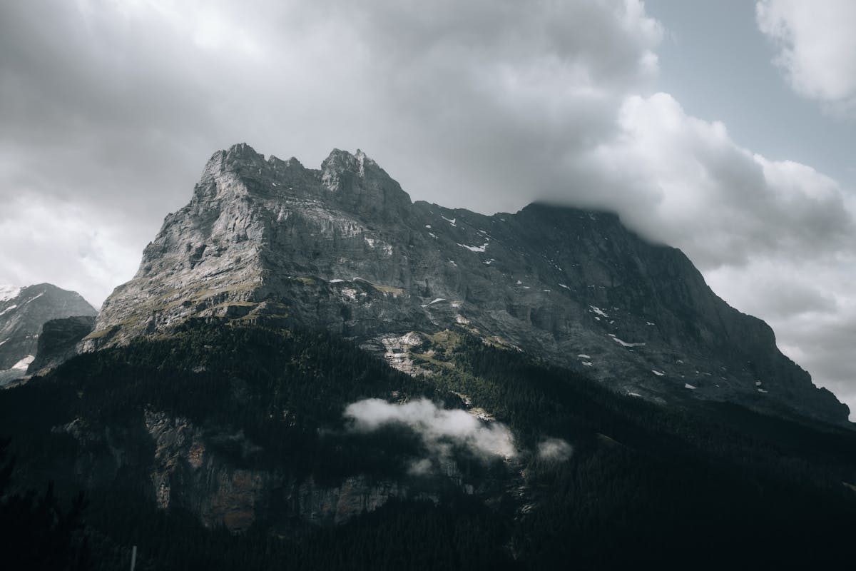 Classic view of the Eiger, Monch and Jungfrau peaks from the Bernese Oberland in Switzerland