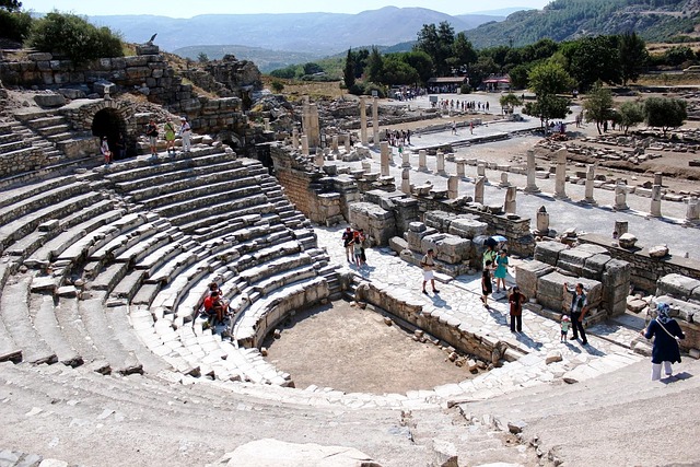 Ancient theatre at Ephesus with curved stone seating rows visible from above