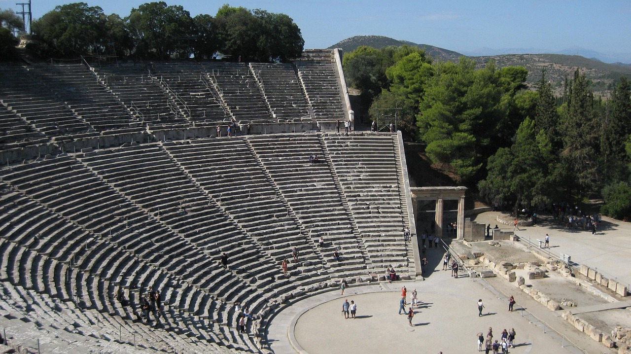 The ancient theatre of Epidaurus with its perfectly preserved stone seating rising up the hillside