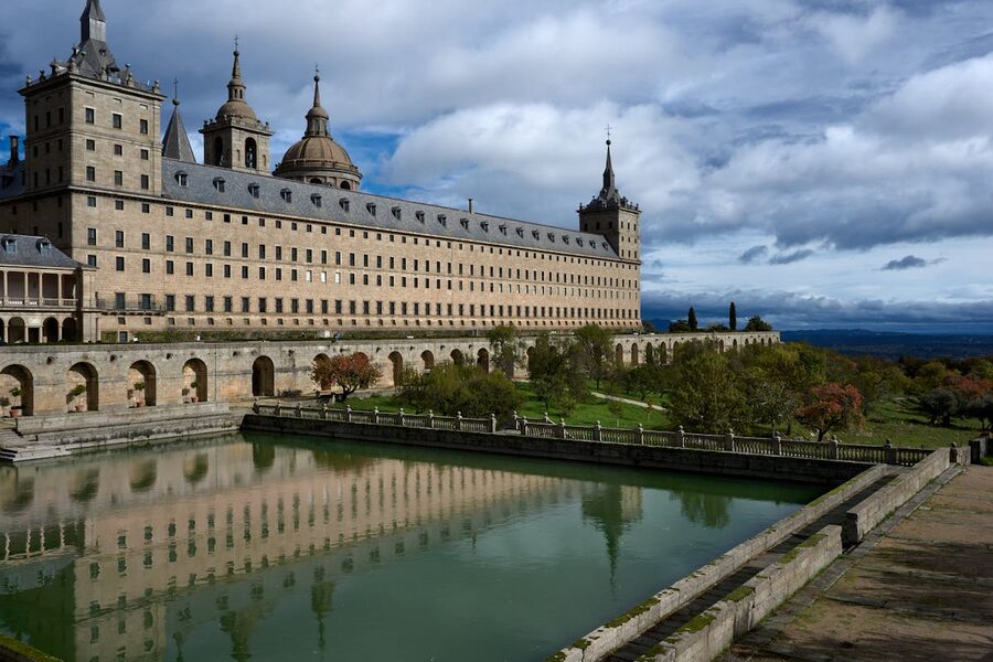 El Escorial monastery reflected in a pond on the grounds