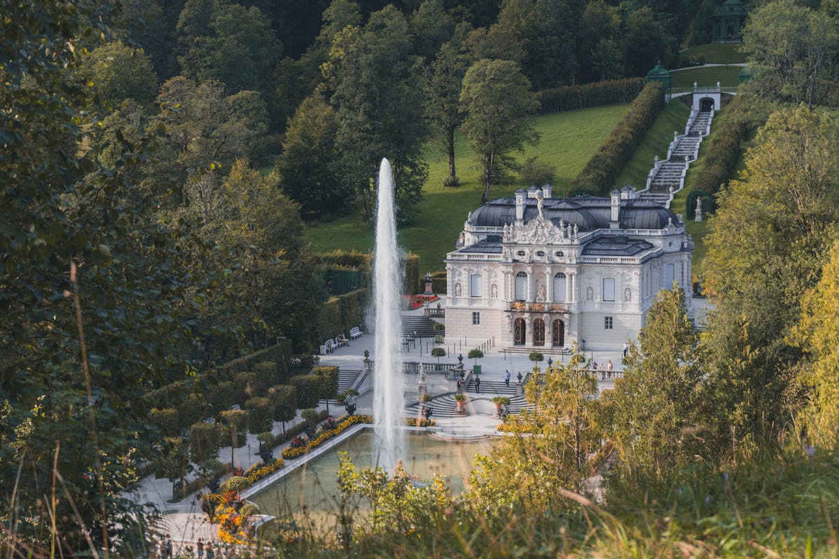 Formal gardens and baroque architecture at Ettal Palace in the Bavarian countryside