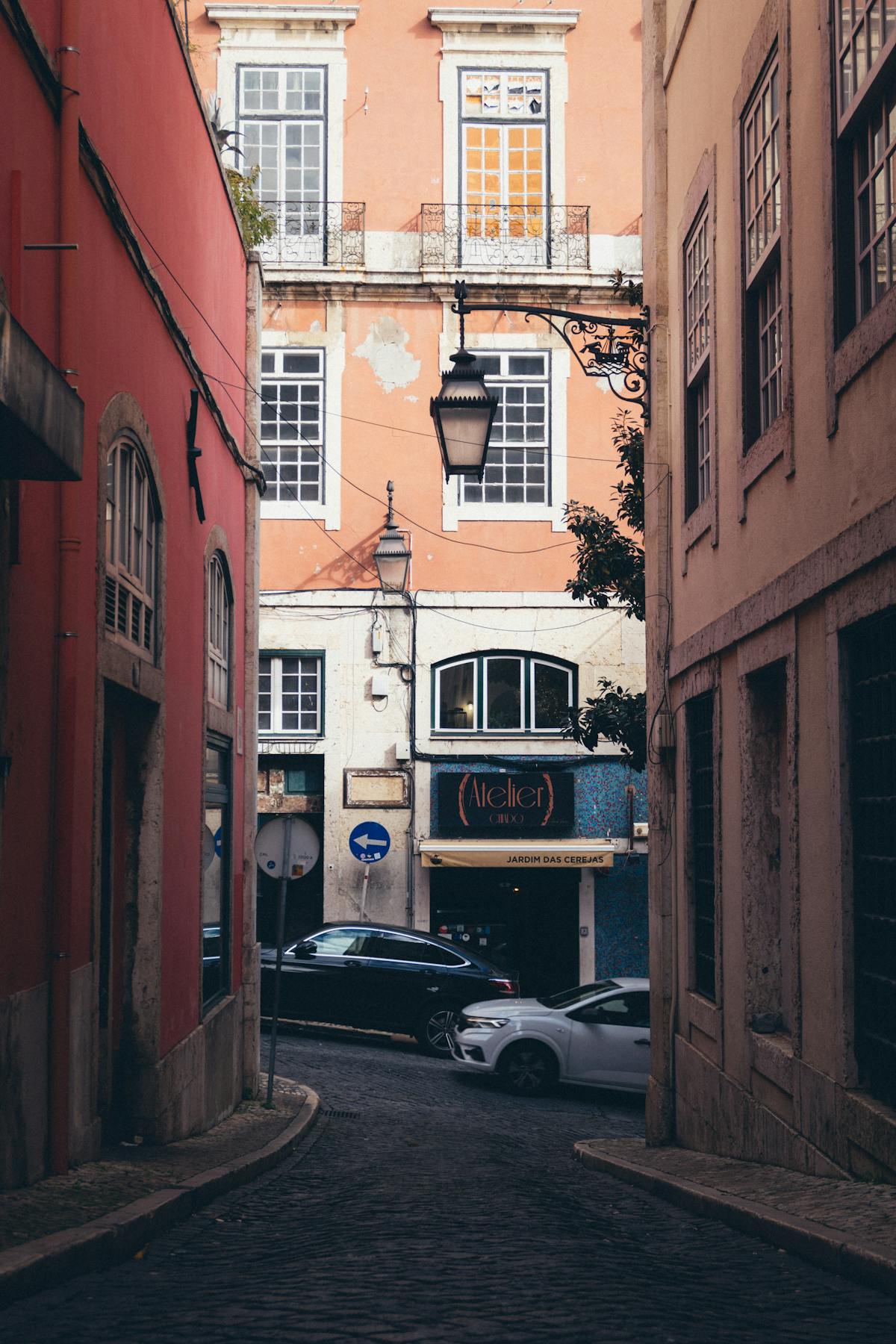 Lisbon street scene at night in a fado neighborhood