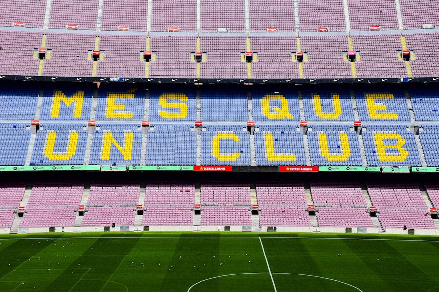 Mes Que Un Club motto displayed on wall at Camp Nou Barcelona