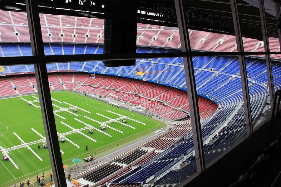 Interior view of Camp Nou stadium bleachers and field in Barcelona