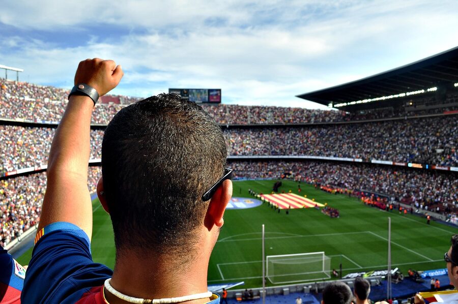 Football fan celebrating at Camp Nou Barcelona stadium