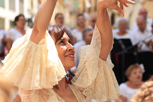 Flamenco dancer in a flowing polka-dot dress performing outdoors in Andalusia
