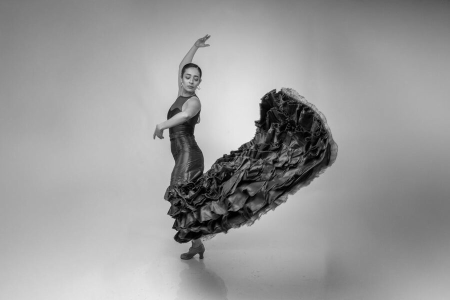 Dramatic black and white photo of a flamenco dancer
