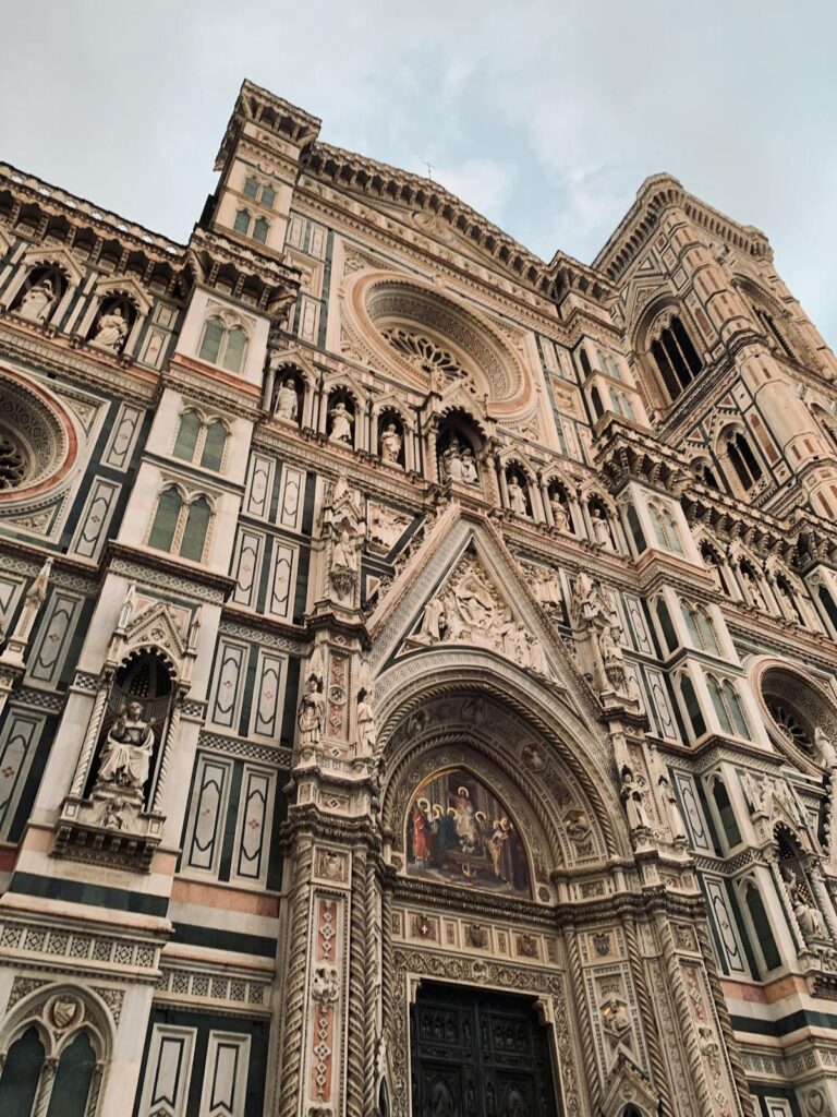 Florence Cathedral facade showing the ornate Gothic marble exterior and iconic terracotta dome