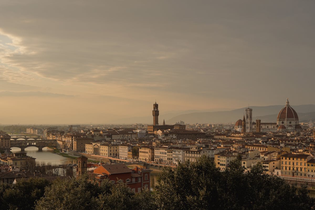 Scenic view of Florence at sunset showing the Duomo and city skyline