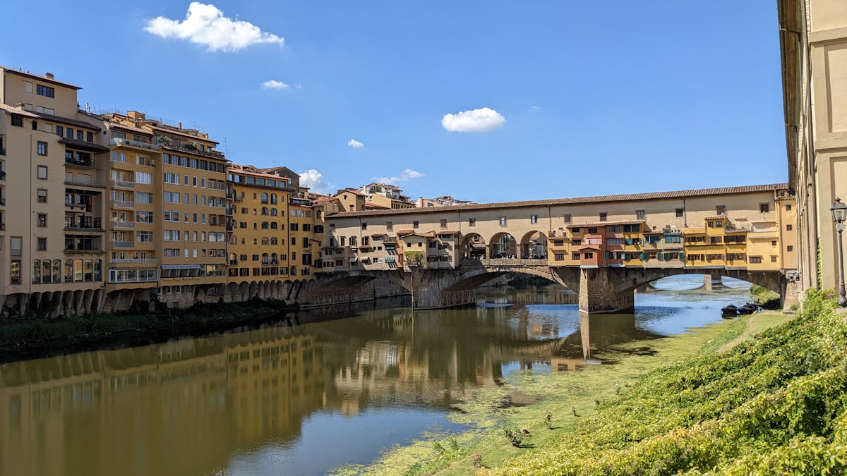 Ponte Vecchio bridge in Florence on a bright sunny day