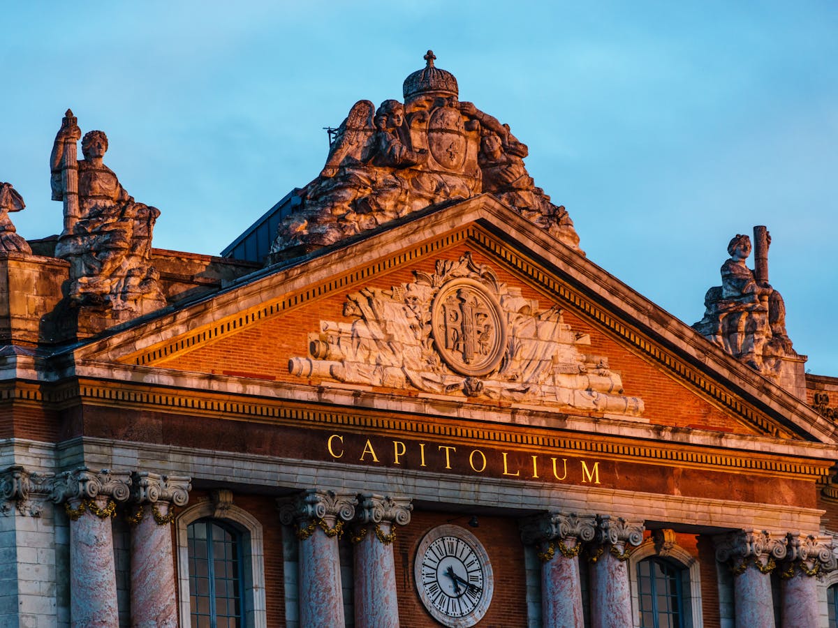 The Capitole de Toulouse building illuminated by golden sunset light