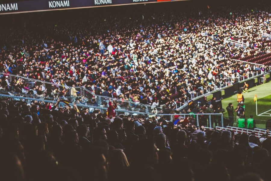 Crowded football stadium packed with fans during a match