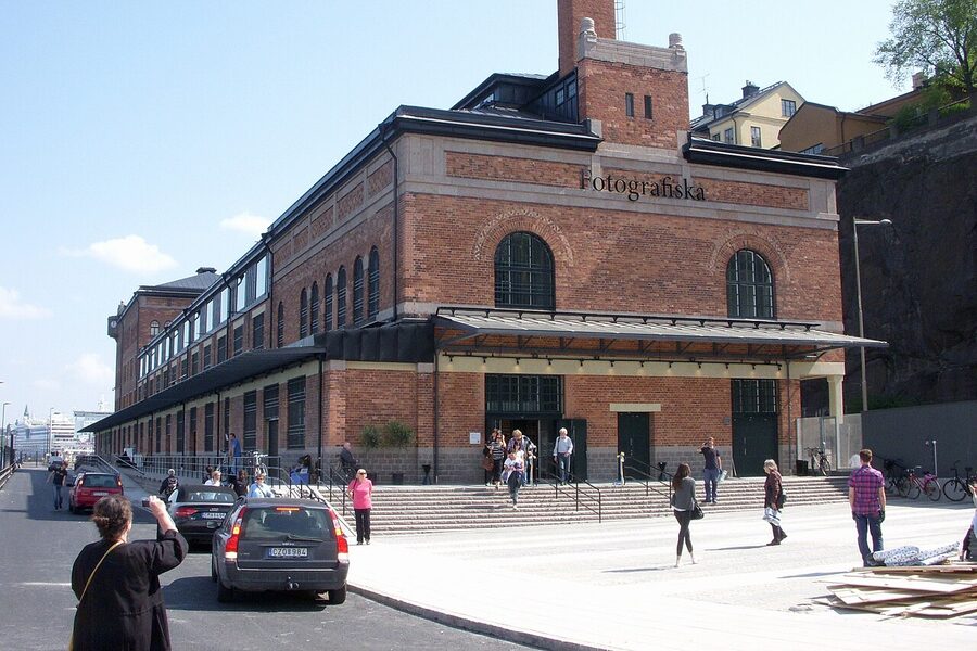 Fotografiska Stockholm illuminated brick facade at night