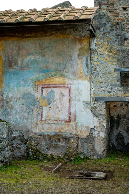 Ancient fresco preserved on a stone wall at an archaeological site near Vesuvius