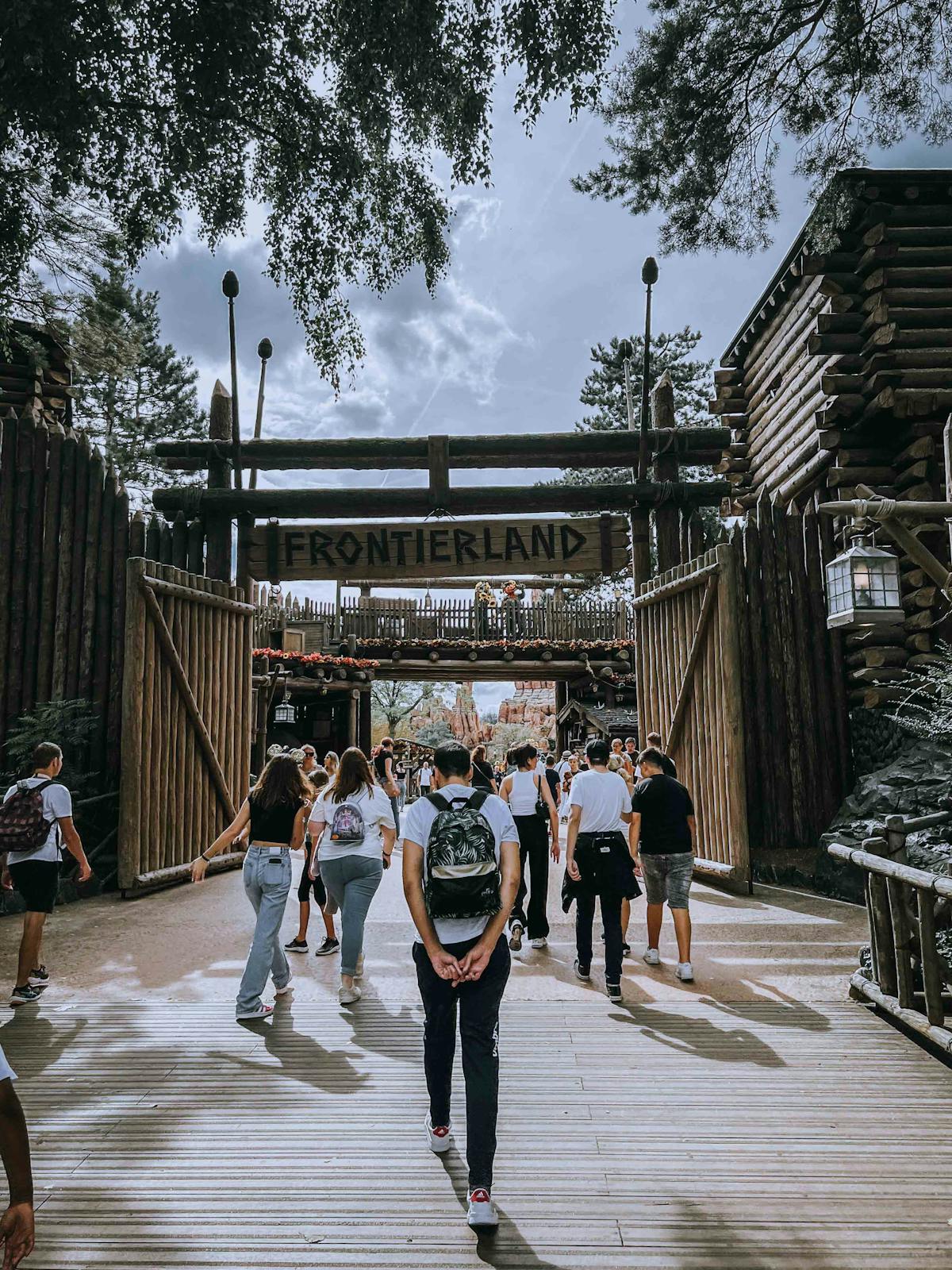 Visitors entering Frontierland at Disneyland Paris