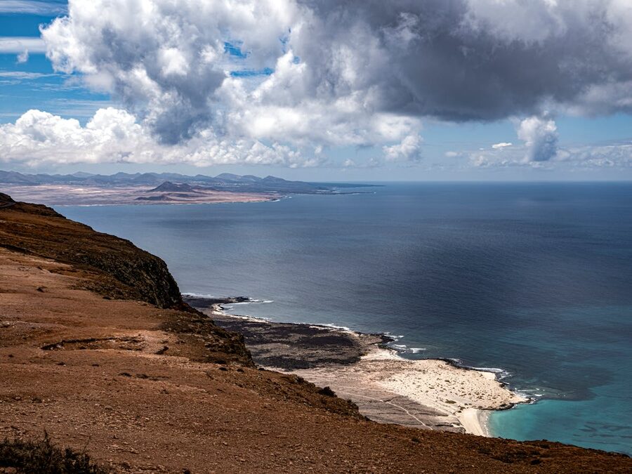 Coastal hills rising from the ocean in Fuerteventura Canary Islands