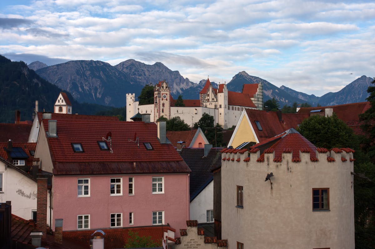 The town of Fussen with its colourful buildings backed by the Bavarian Alps