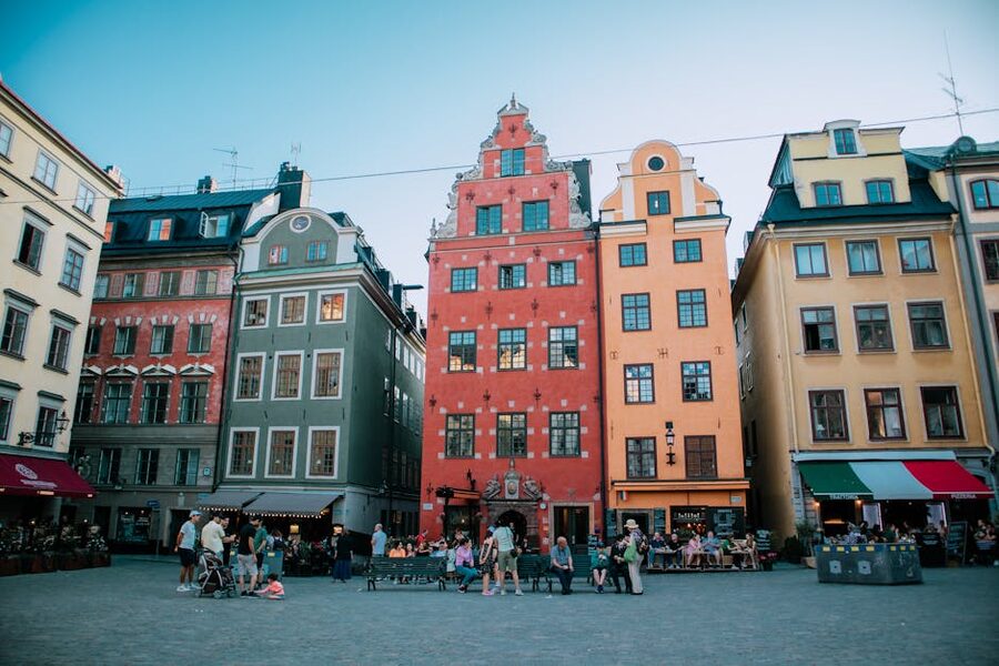 Historic buildings in Gamla Stan Stockholm Old Town with pedestrians