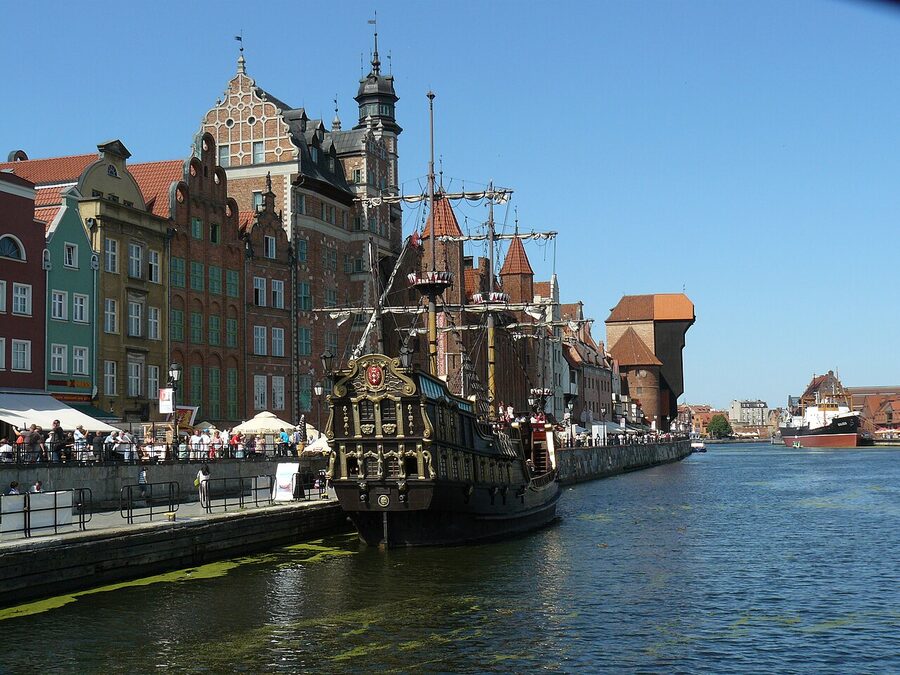 Galleon Lion cruise ship passing the Gdańsk Crane on the Motława