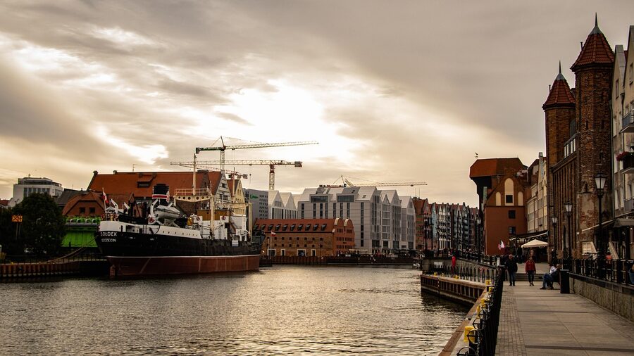 Tourist boats moored along Gdańsk Old Port promenade