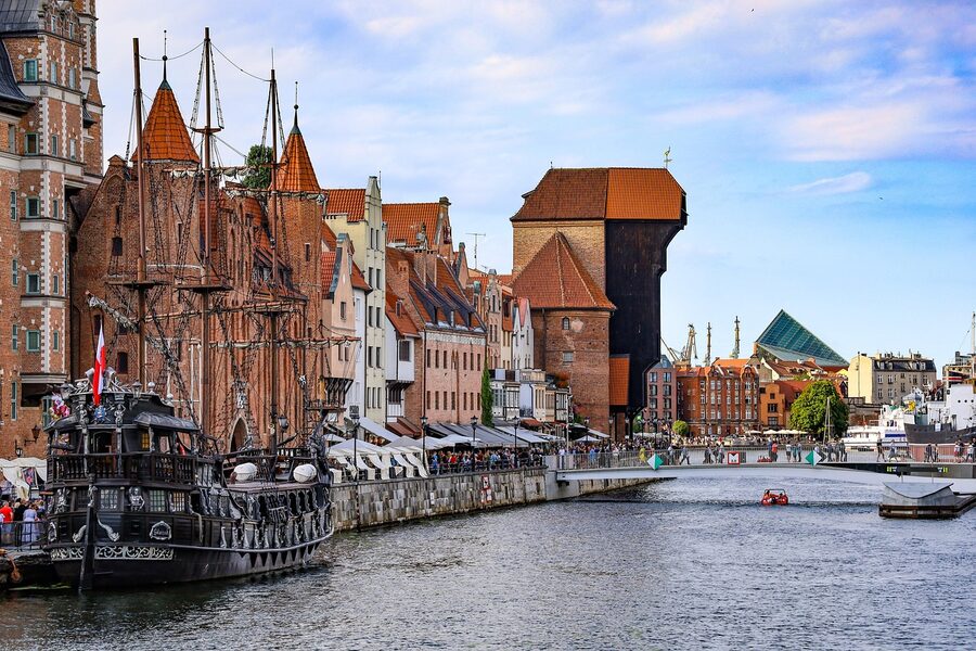 Motlawa River and Gdansk old town panorama with tenements