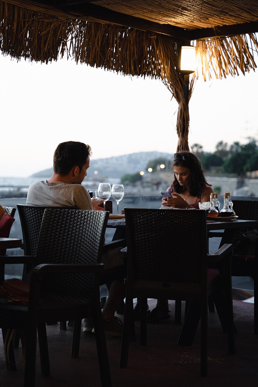Italian wine and food on a table in the evening