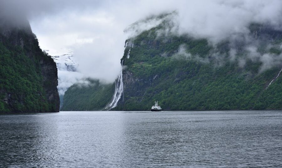 Geiranger Fjord with mist and waterfalls