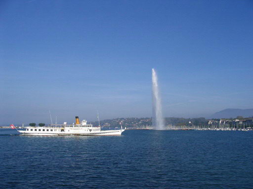 Geneva Jet d Eau with tourist boat passing