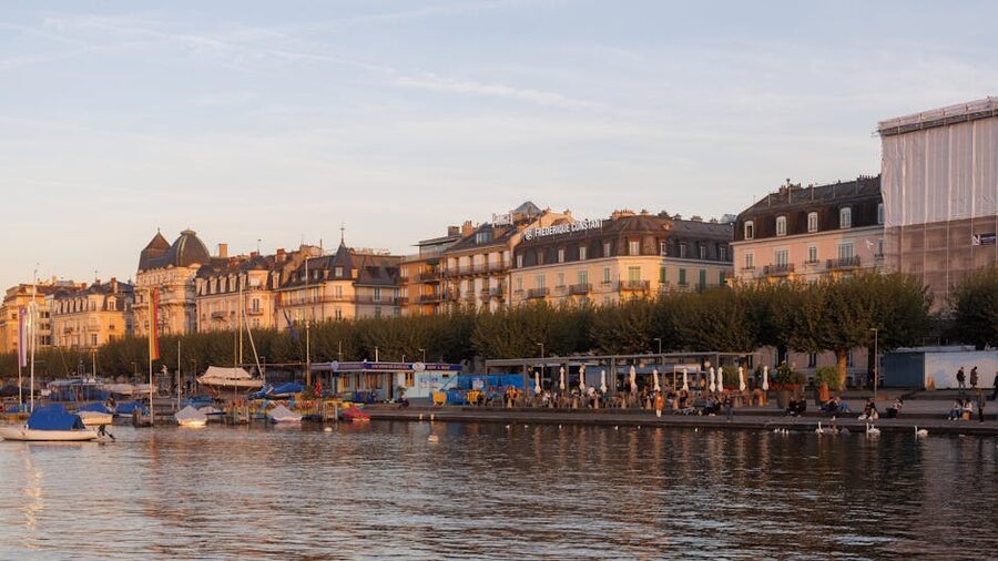 Geneva waterfront sunset historic buildings boats