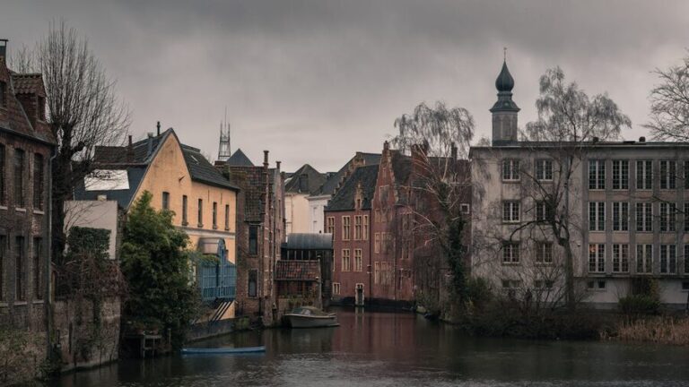 Historic canal and old town architecture in Ghent Belgium