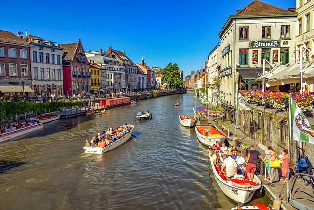 River promenade with medieval buildings in Ghent Belgium